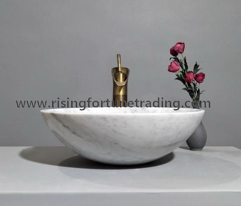 white marble round sink