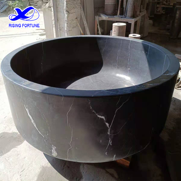 black marble round bathtub