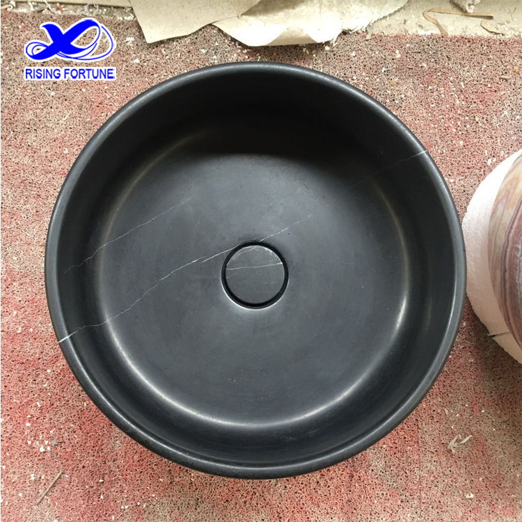 black marble round sink