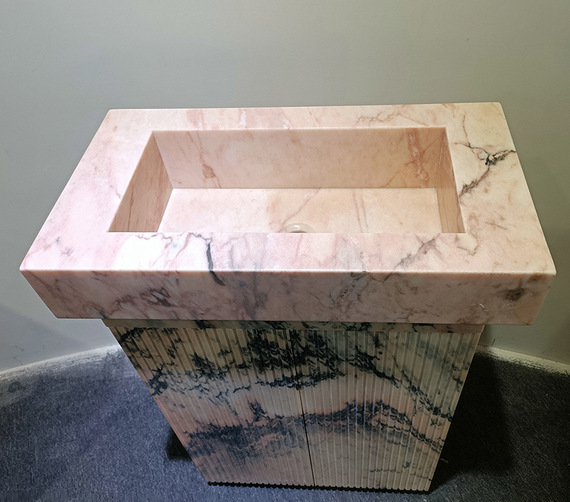 Pink marble bathroom vanity