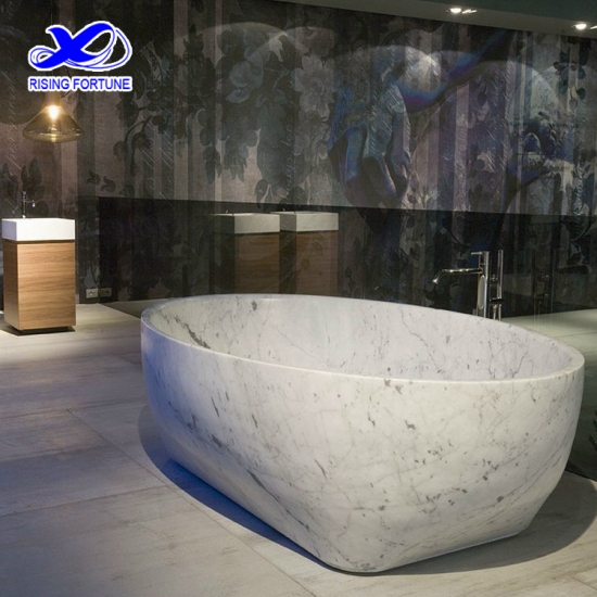 Freestanding oval white marble bathtub