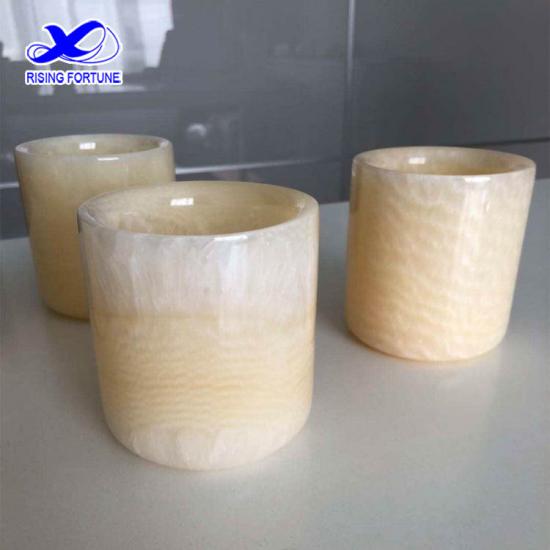 Clear yellow onyx candle holder