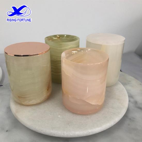 The luxuriate pink onyx candle vessel with glass insert and rose gold lid