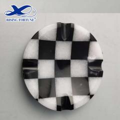 white and black marble ashtray