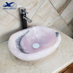 Modern style pink onyx material wash basin